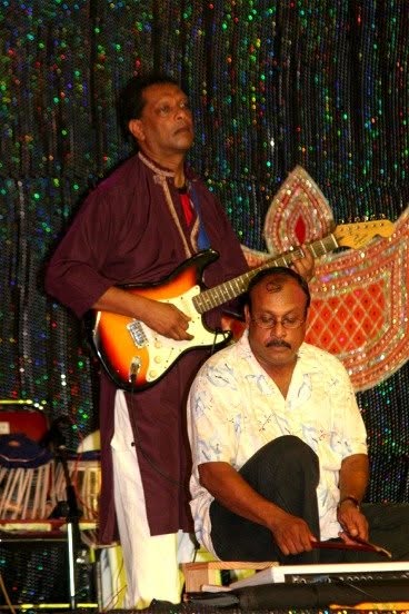 Seeram Ken Maharaj playing electric guitar at Divali Nagar