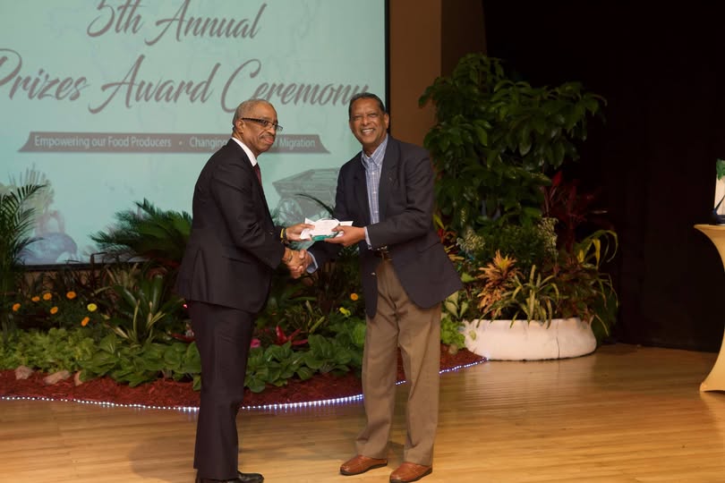 Seeram Ken Maharaj receiving the IICA Prize