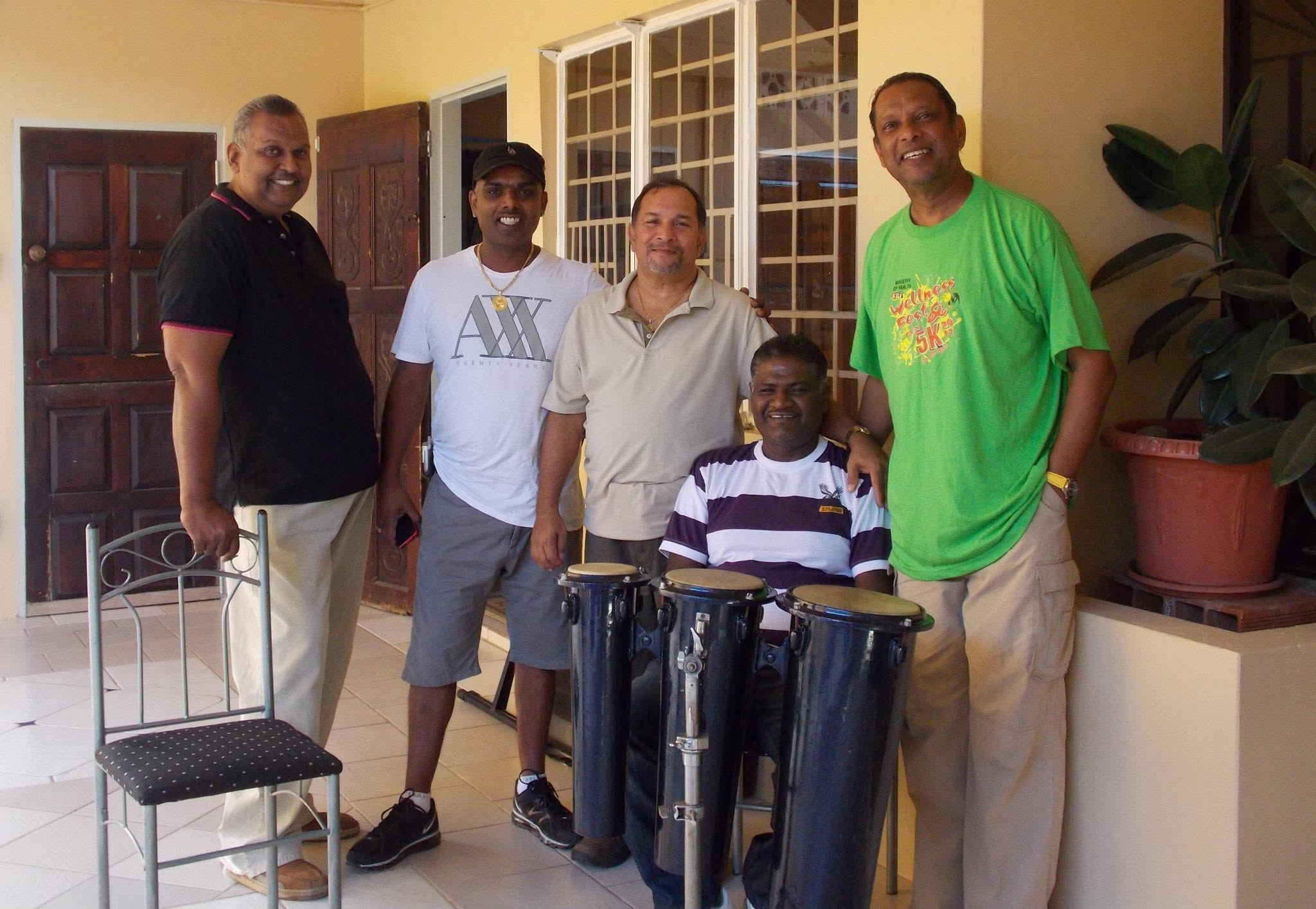 Seeram Ken Maharaj with fellow musicians at a Melo Bugs reunion