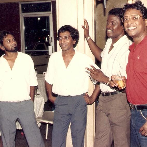Presentation College Chaguanas reunion photograph with Seeram Ken Maharaj in the red shirt